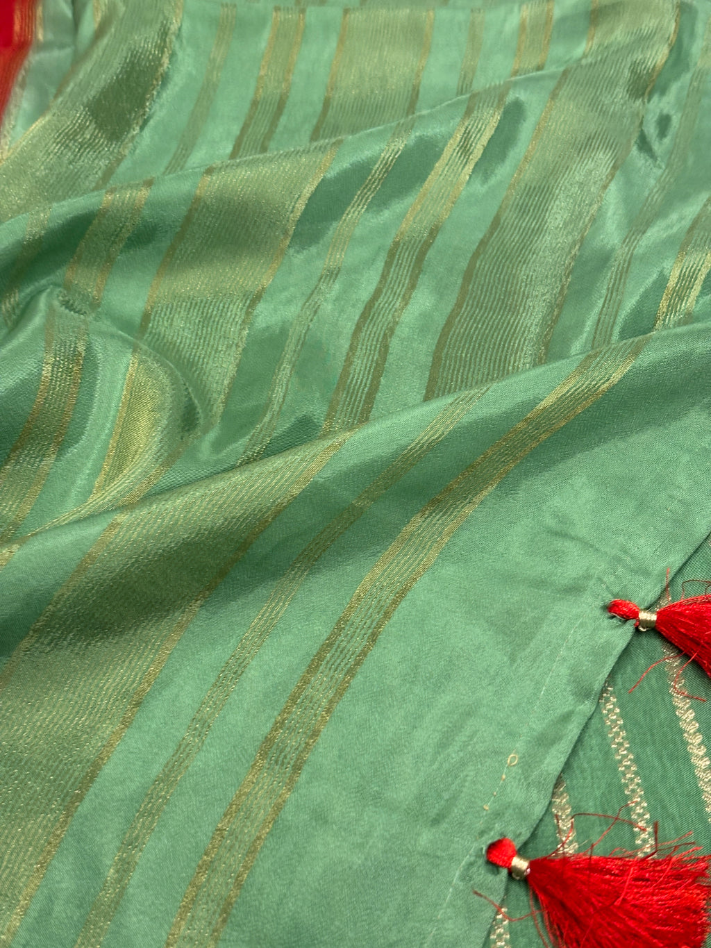 Crimson Red Katan Silk Saree with Gold Buti & Sage Green Satin Zari Border