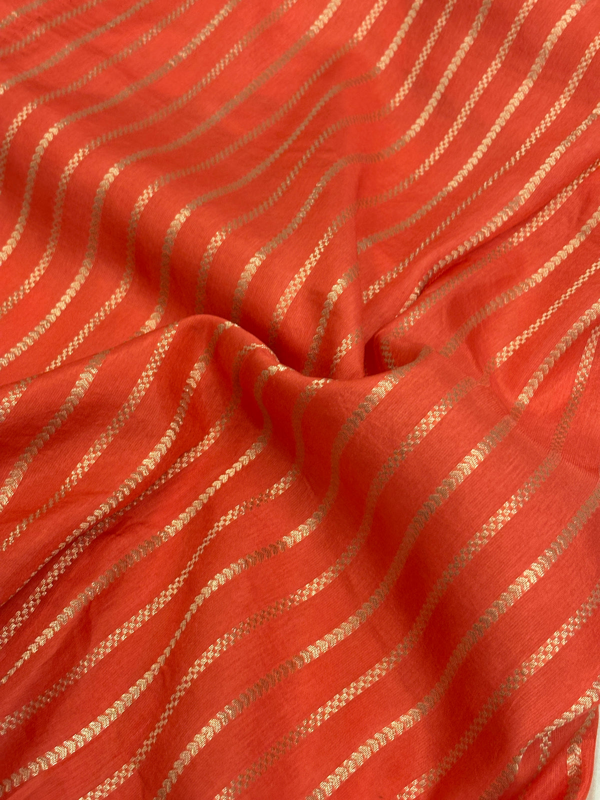 Jet Black Crepe Silk Saree with Gold Zari Buti & Coral Peach Brocade Border