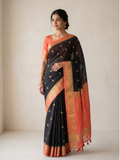 Jet Black Crepe Silk Saree with Gold Zari Buti & Coral Peach Brocade Border